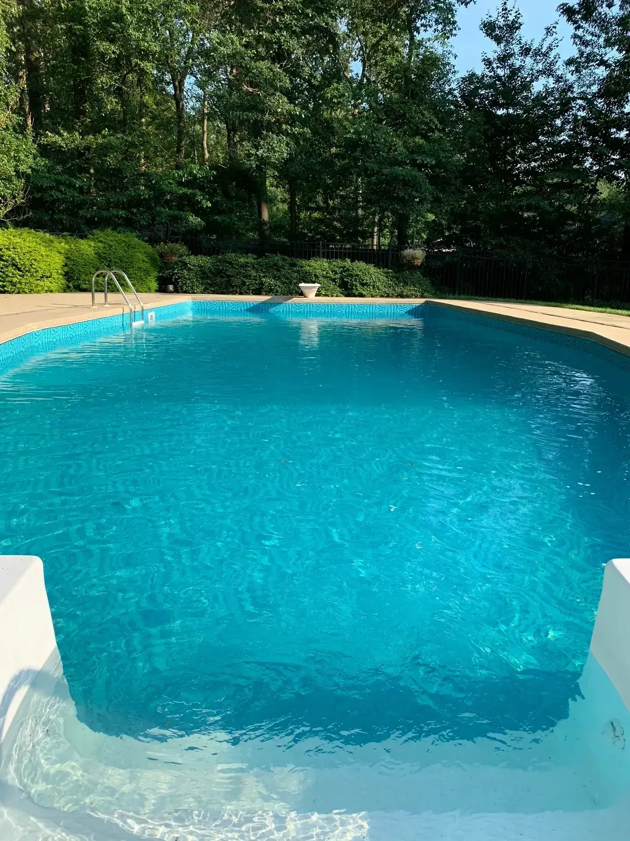 A pool with a lot of water in it