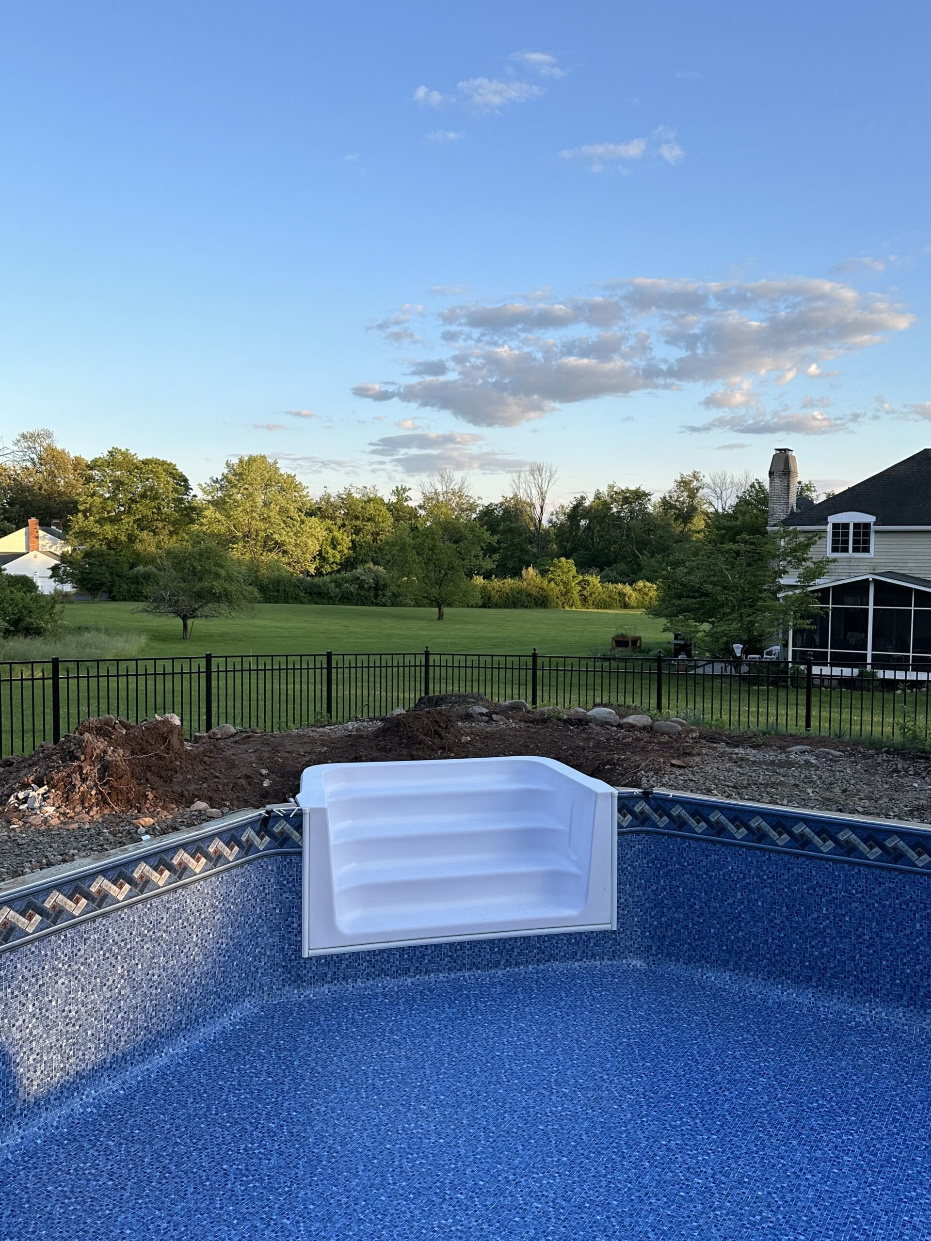 A pool that has been cleaned and is ready for the summer.